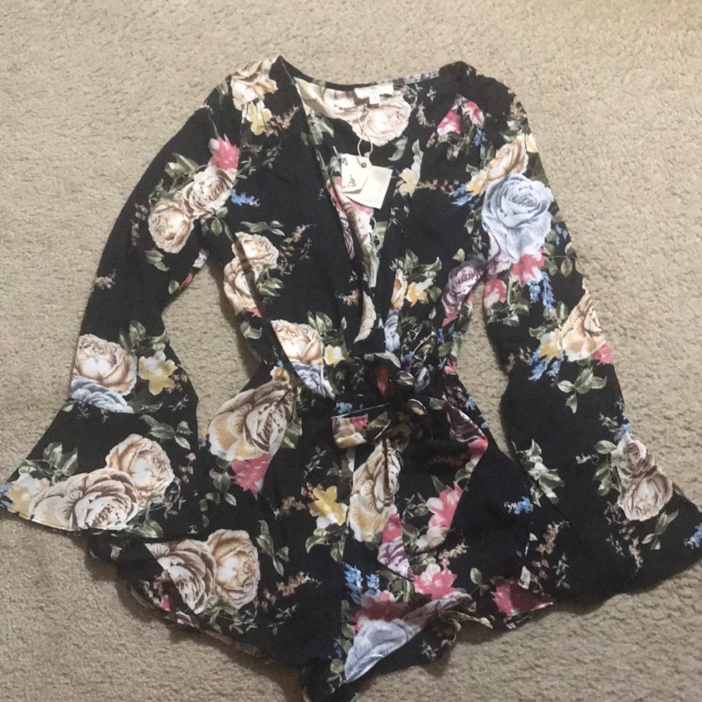 New with tags, small longsleeve romper